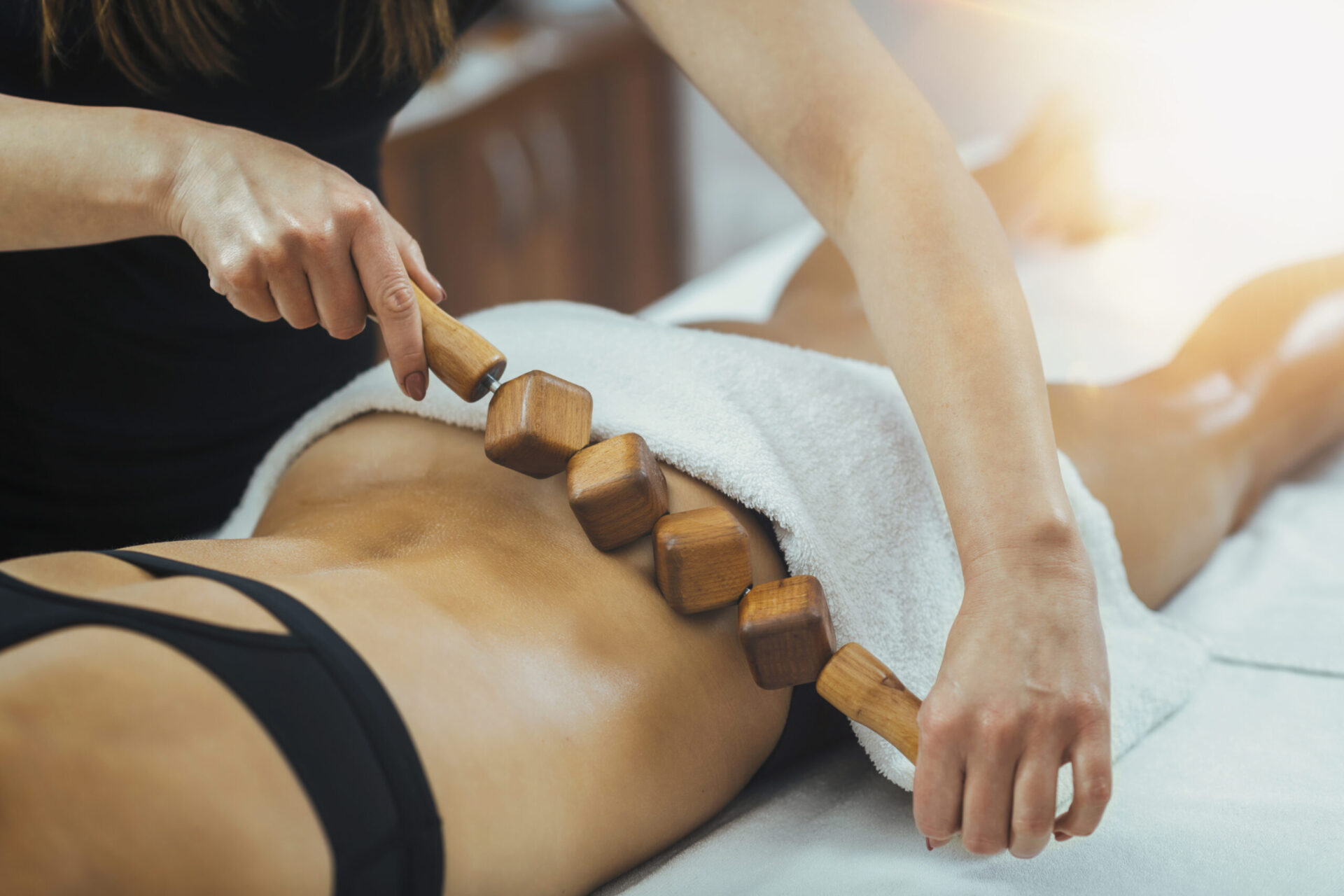 Lymphatic system stimulation with maderotherapy body treatment